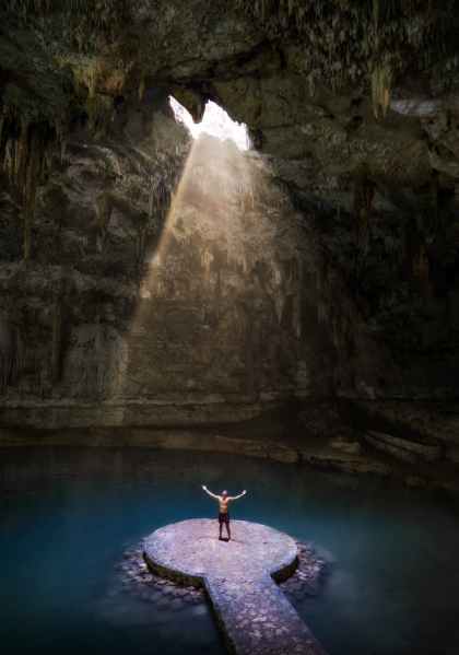 person standing under the sunbeam