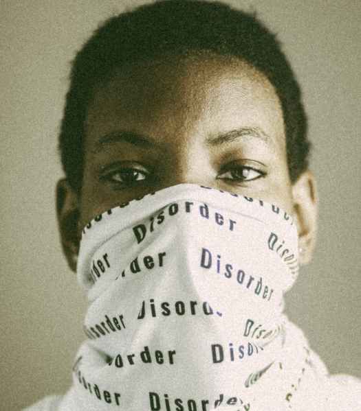 serious black person in balaclava